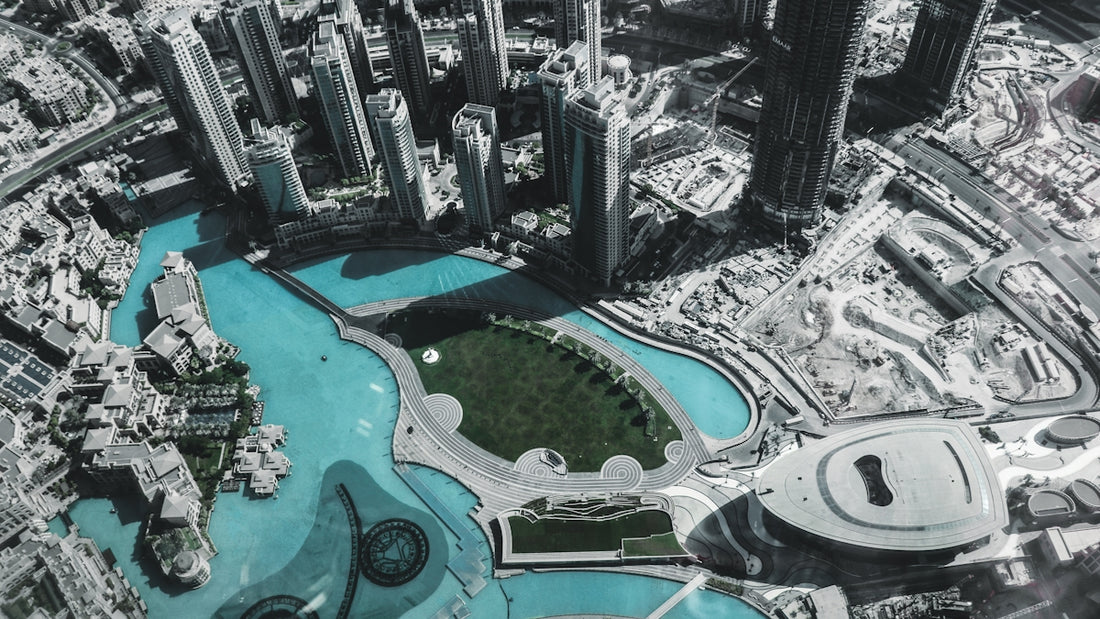 an aerial view of a city with a river running through it