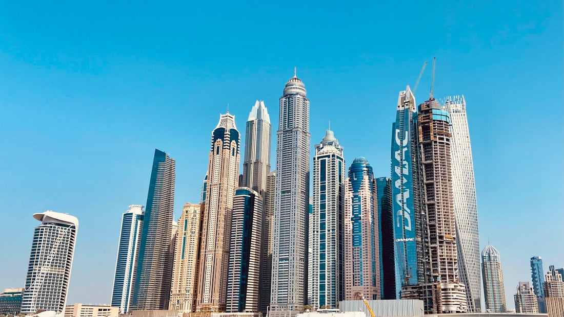 a large group of tall buildings in a city