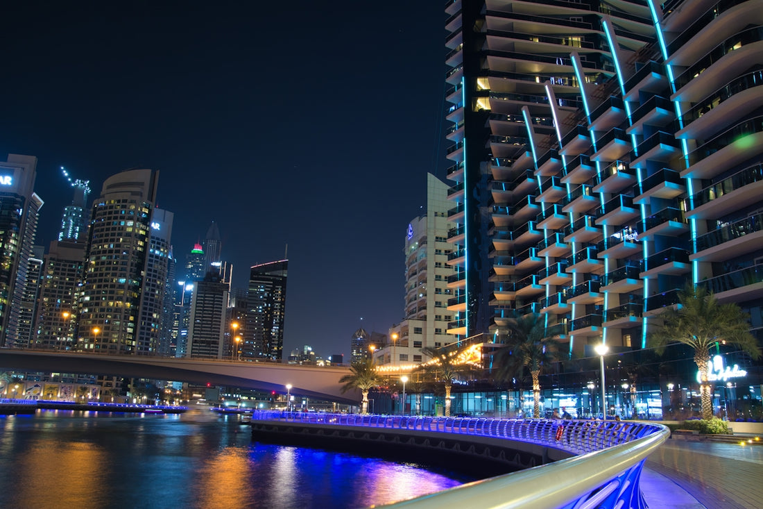 a view of a city at night from across the river