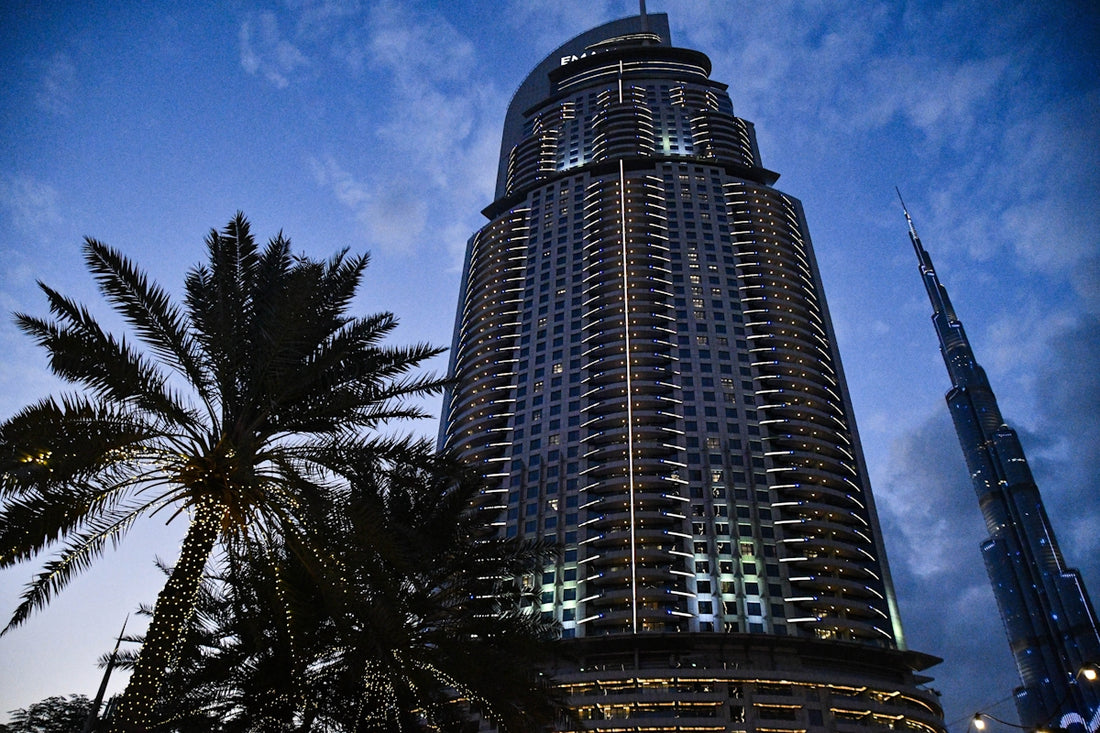 a tall building with a clock on the top of it