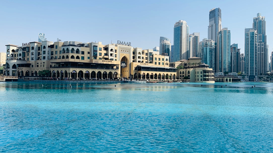 A large body of water with a city in the background