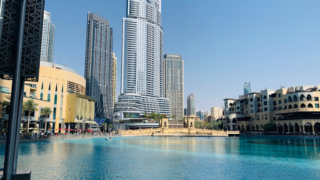 A large body of water surrounded by tall buildings