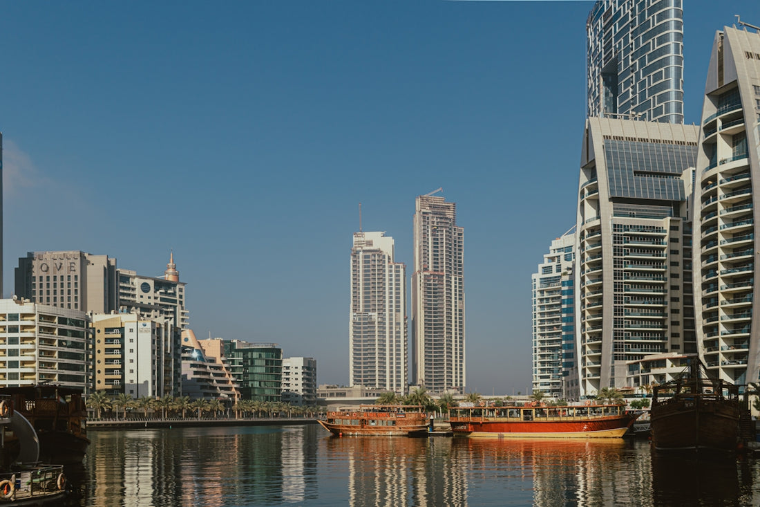 A body of water surrounded by tall buildings