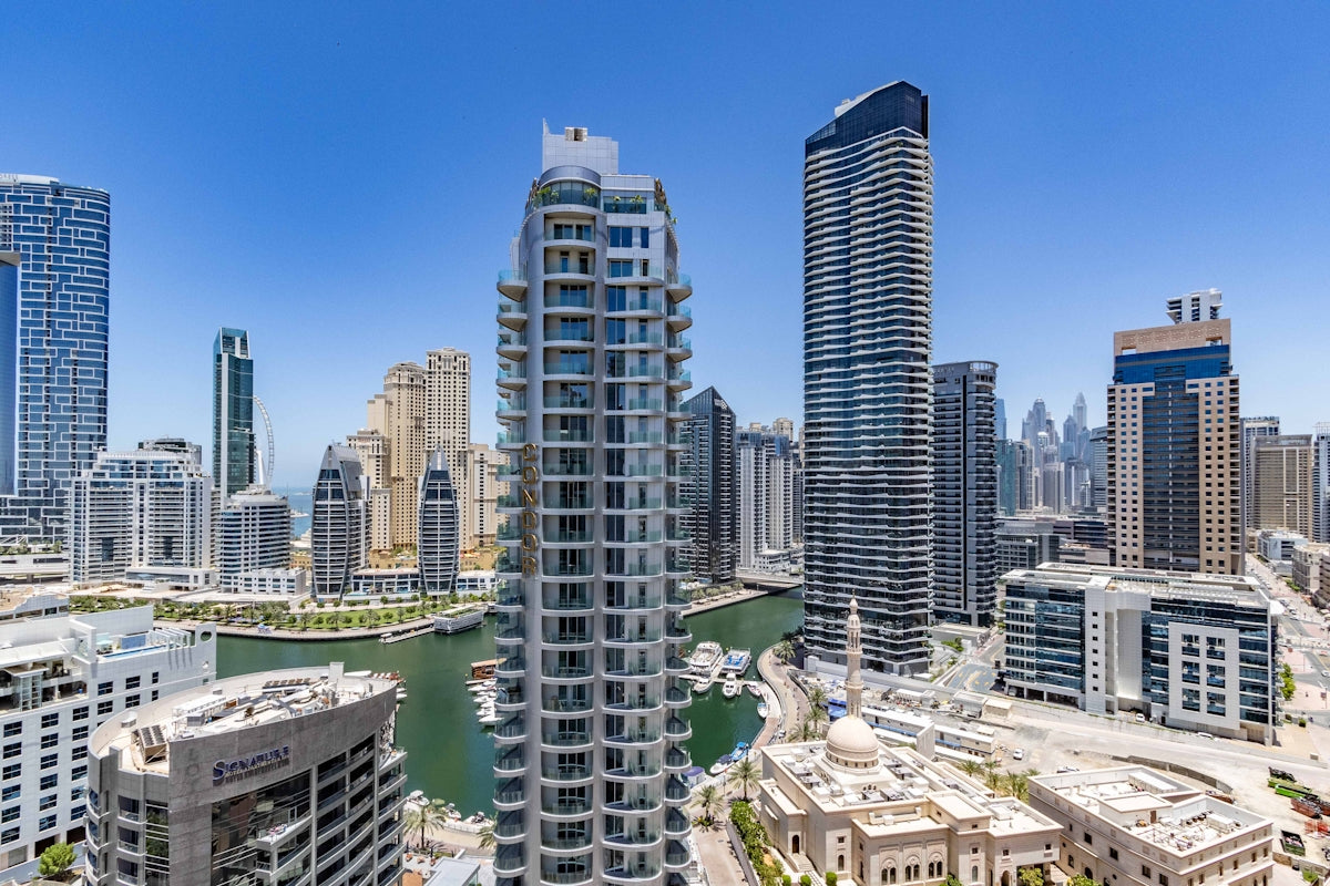 A panoramic view of a city with tall buildings