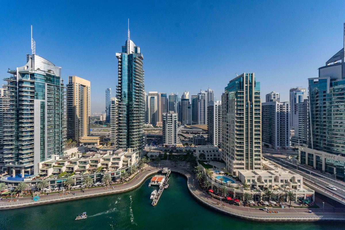 A large body of water surrounded by tall buildings