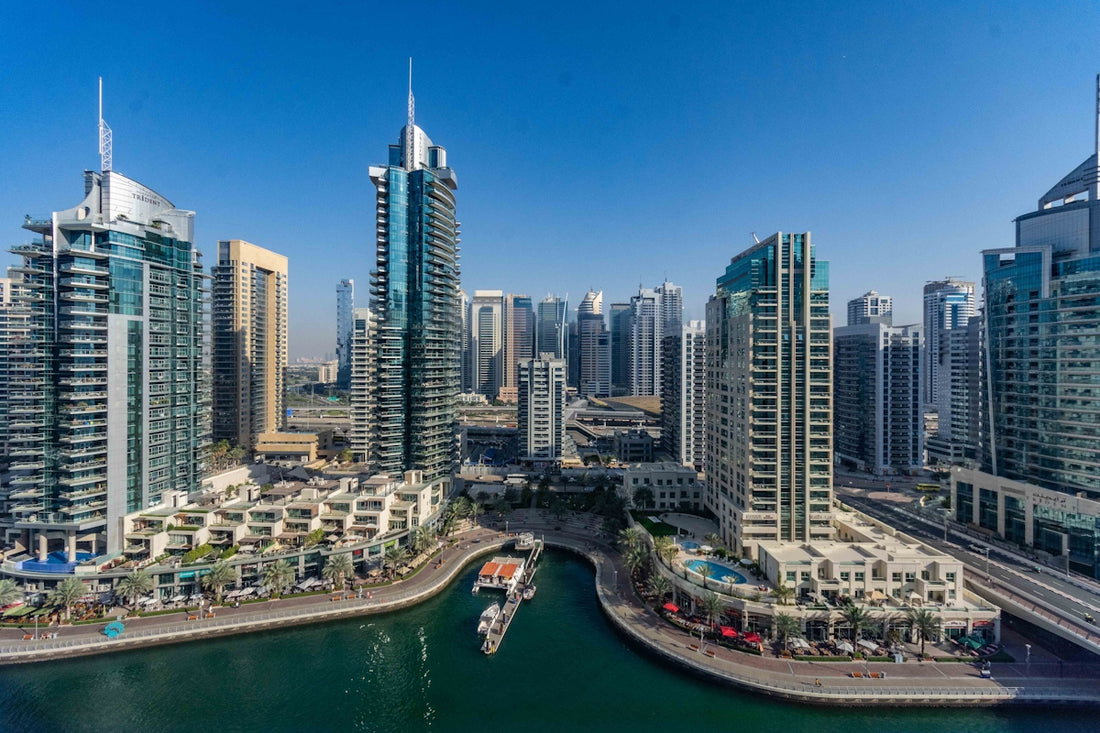 A large body of water surrounded by tall buildings