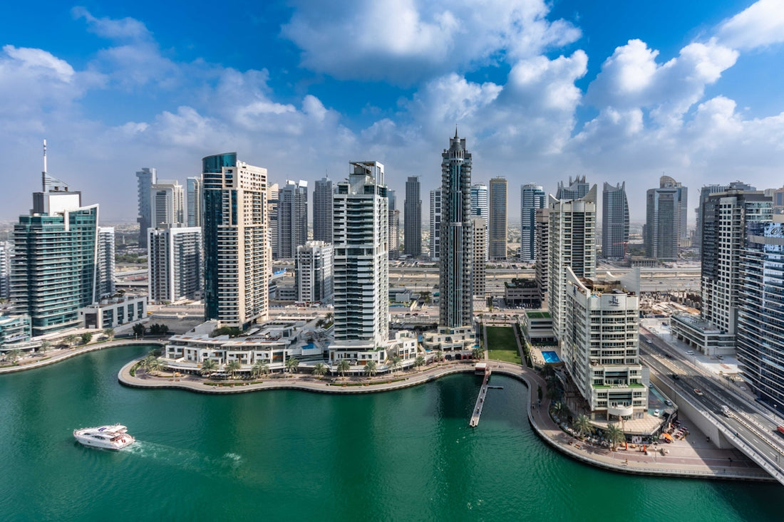 A large body of water surrounded by tall buildings