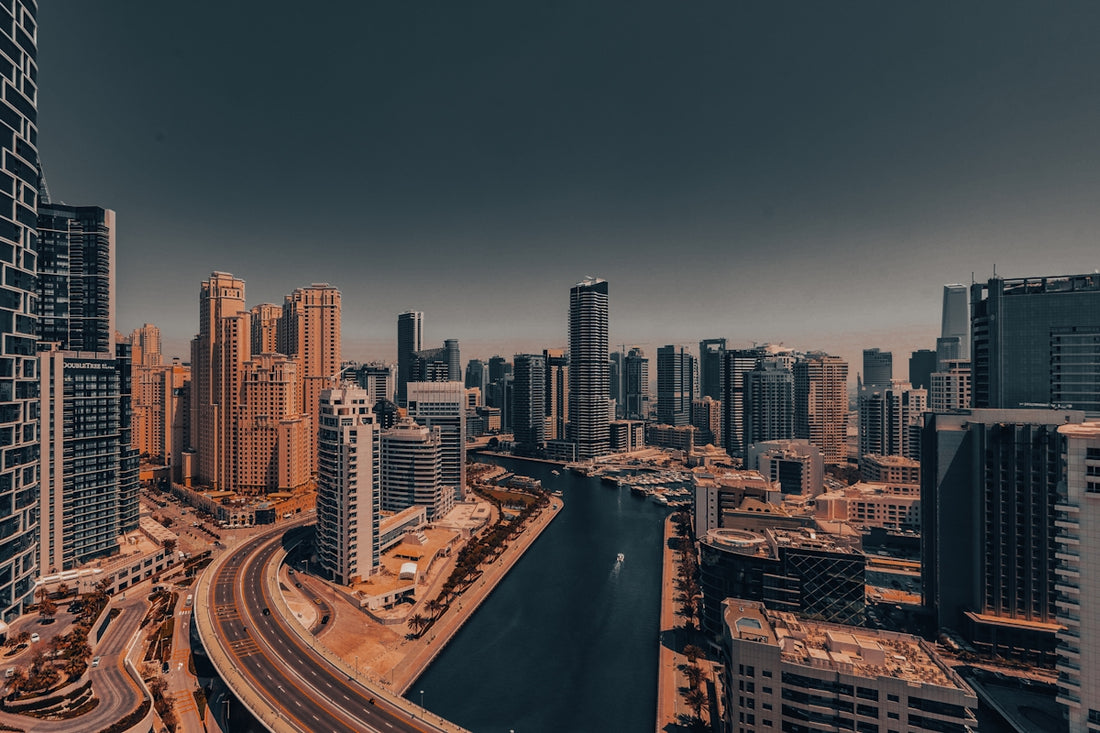 An aerial view of a city with tall buildings