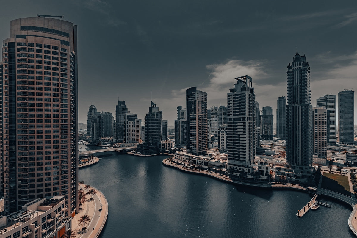 A large body of water surrounded by tall buildings