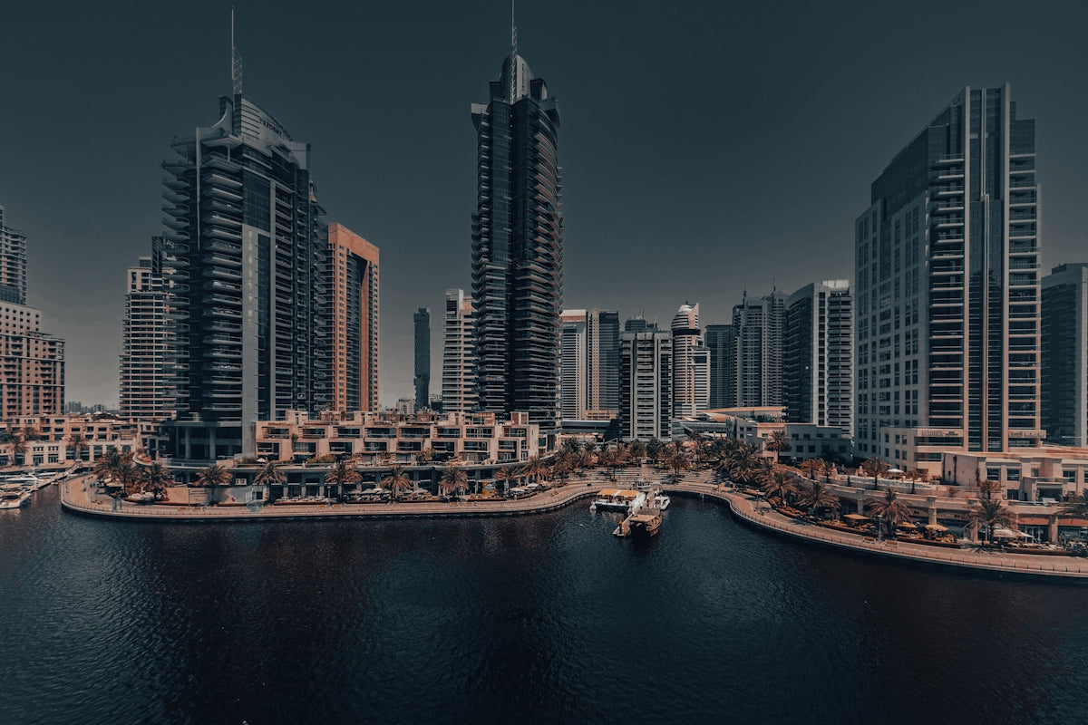 A large body of water surrounded by tall buildings