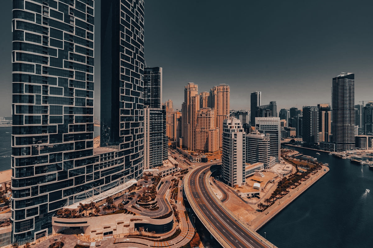 An aerial view of a city with tall buildings