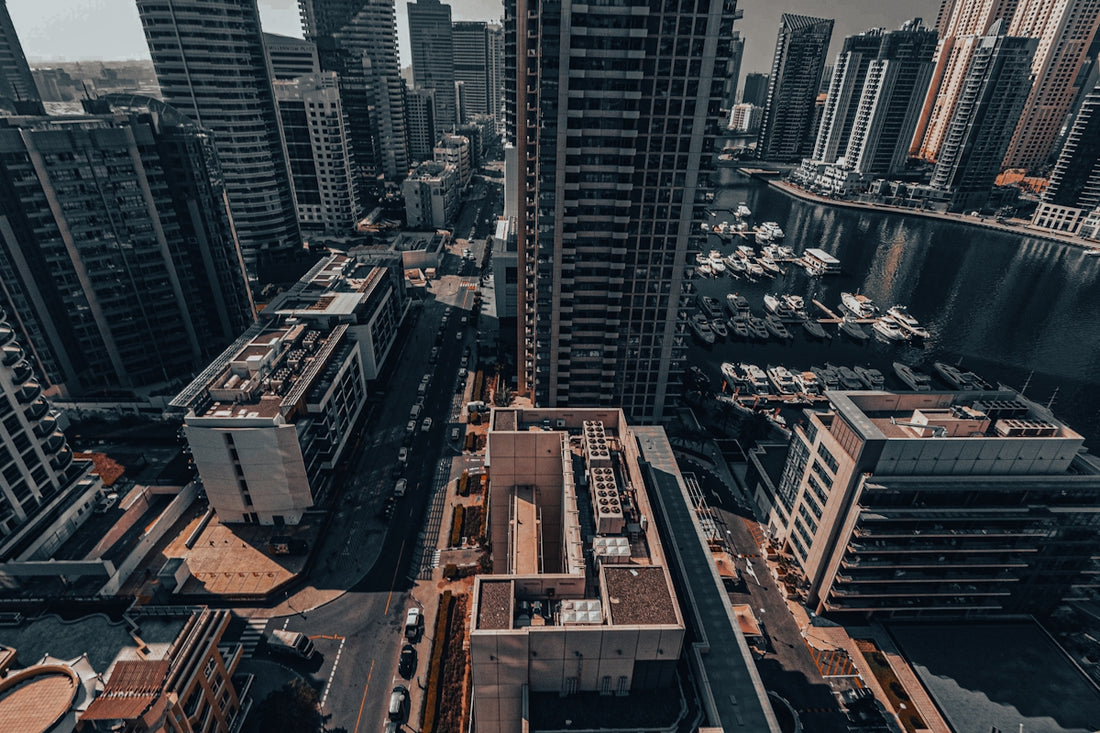 An aerial view of a city with tall buildings