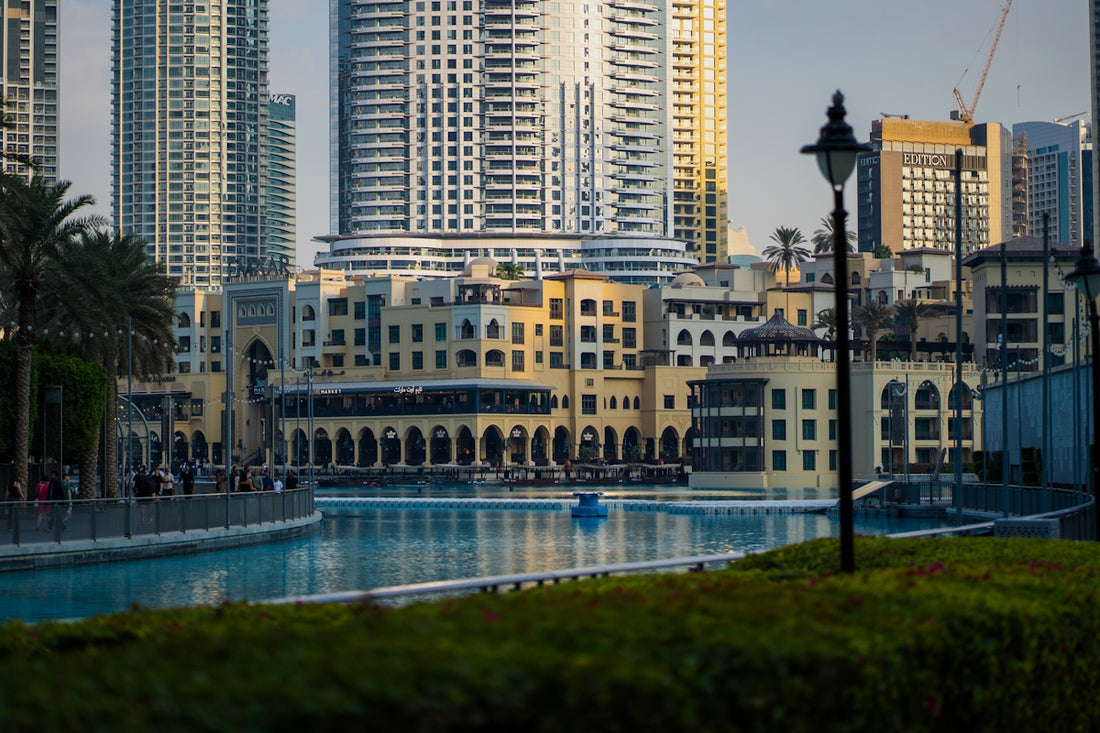 A view of a city with tall buildings in the background