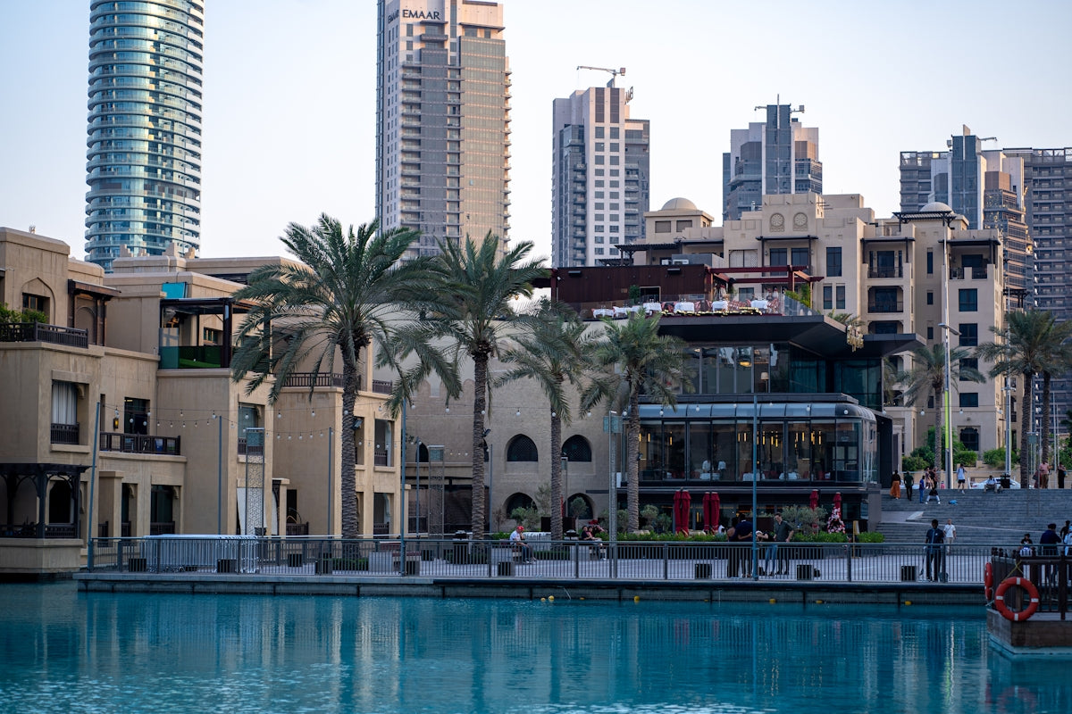 A large body of water surrounded by tall buildings