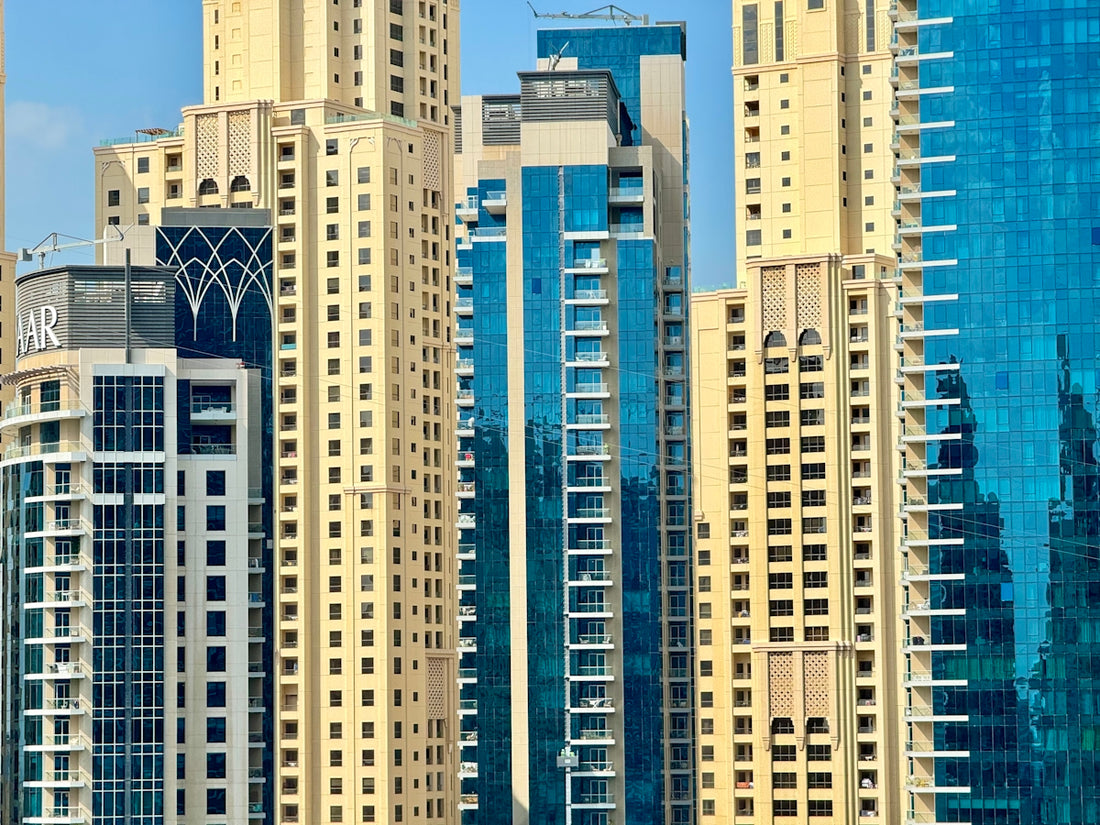 A large group of tall buildings in a city